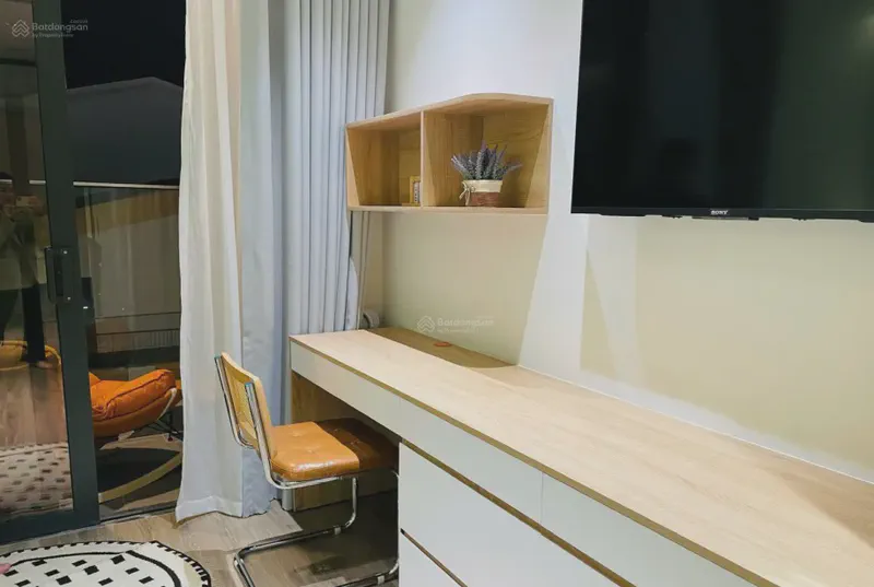 Sun Cosmo Residence 1-Bedroom 28m² for rent in Bac My Phu, Da Nang — furnished living space (photo 7 of 10)