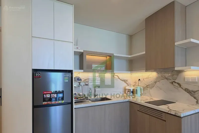 Sun Cosmo Residence 1-Bedroom 55m² for rent in Bac My Phu, Da Nang — kitchen and dining
