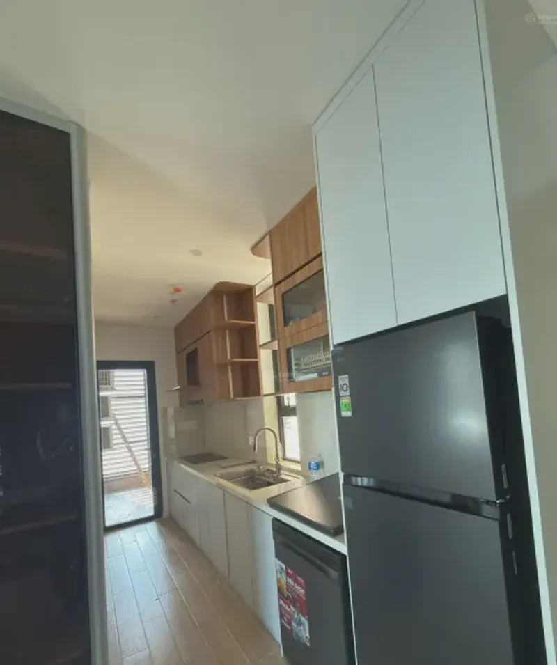 Sun Cosmo Residence River View 2-Bedroom 70m² for rent in Bac My Phu, Da Nang — kitchen and dining